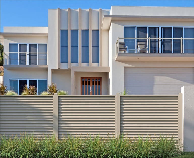 Residential property boundary with contemporary architectural screening