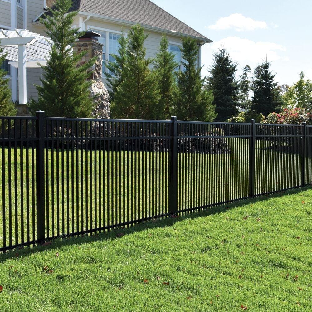 VALUNO aluminum picket fence installed around a contemporary property