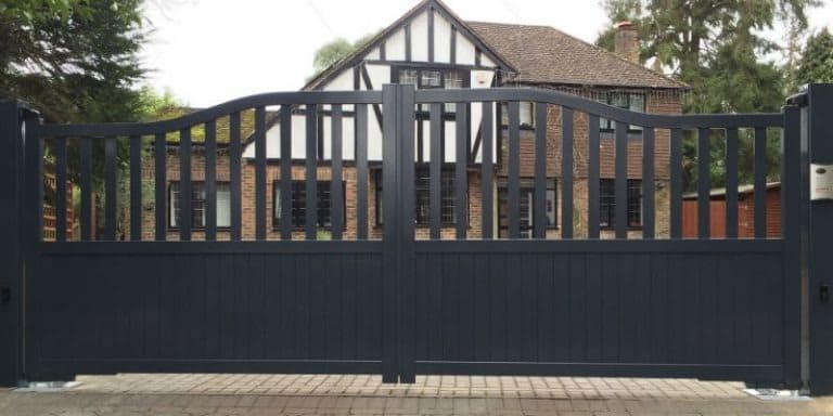 Wide aluminum driveway gate in a contemporary architectural project