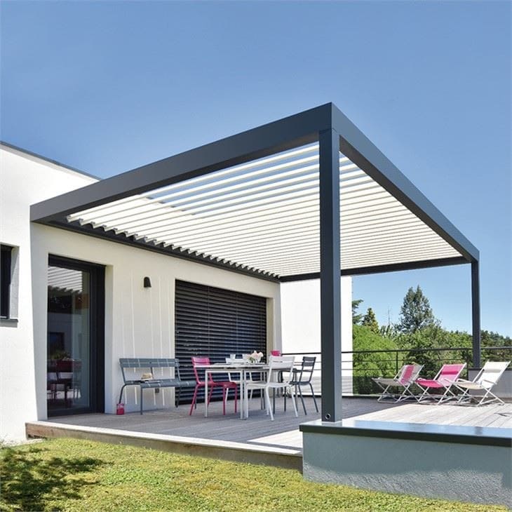 Wall-mounted aluminum pergola connected to a contemporary building facade