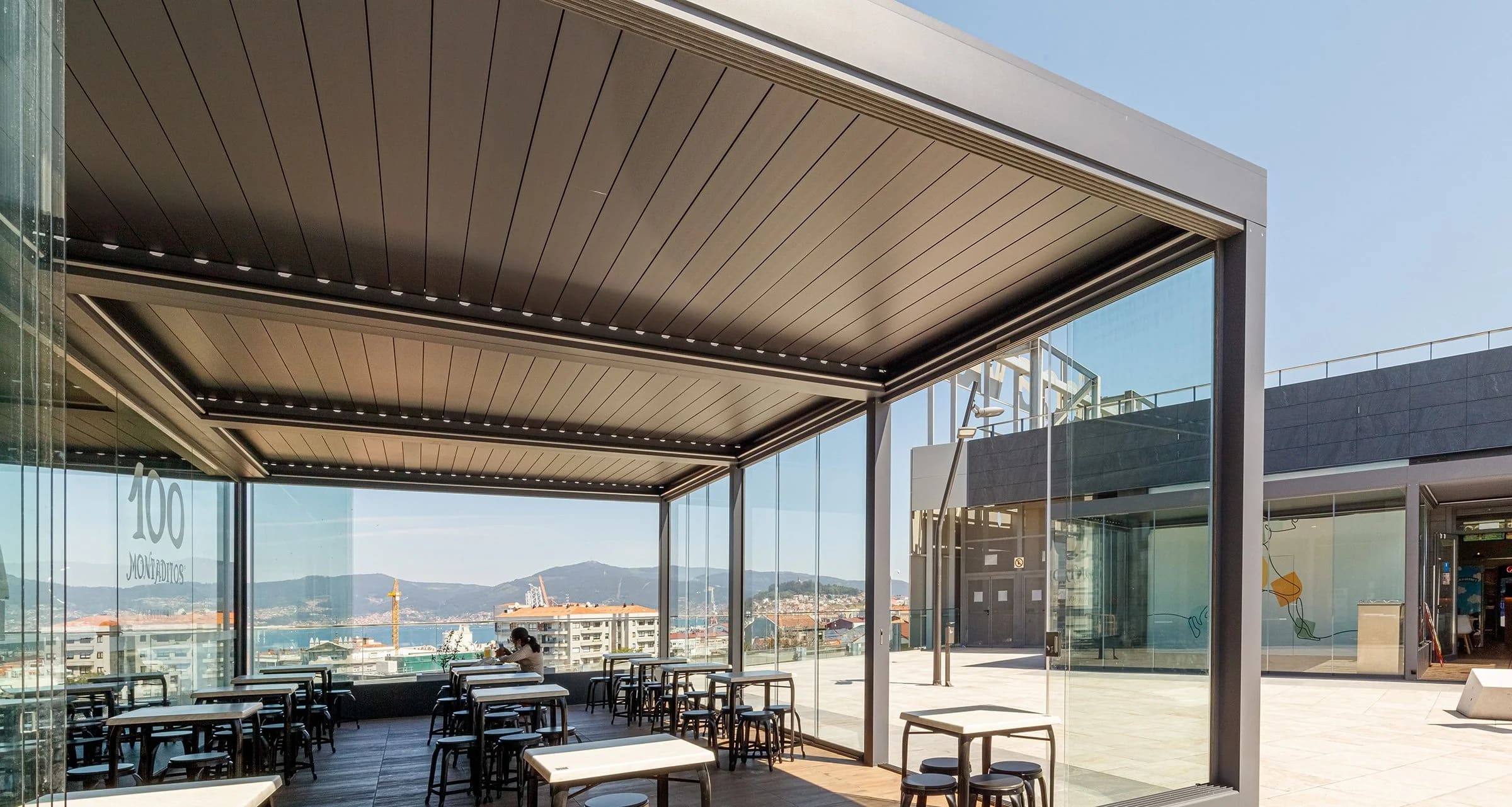 Glass pergola for a restaurant or cafe